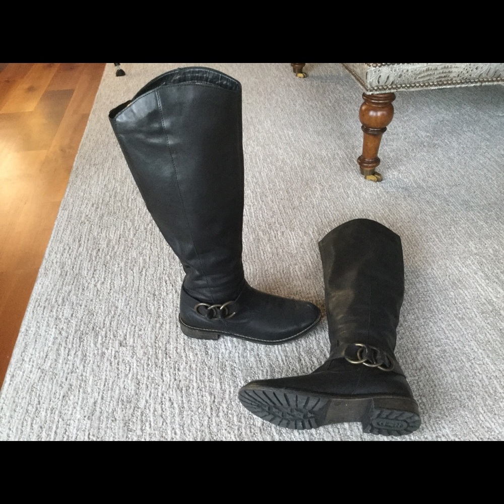 Tall black leather boots